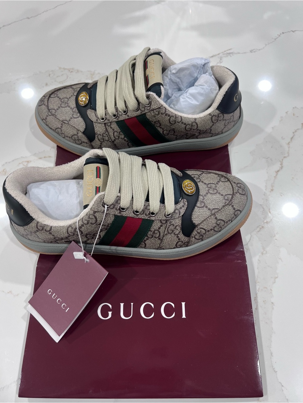 Gucci
Screener GG Supreme Canvas Sneakers